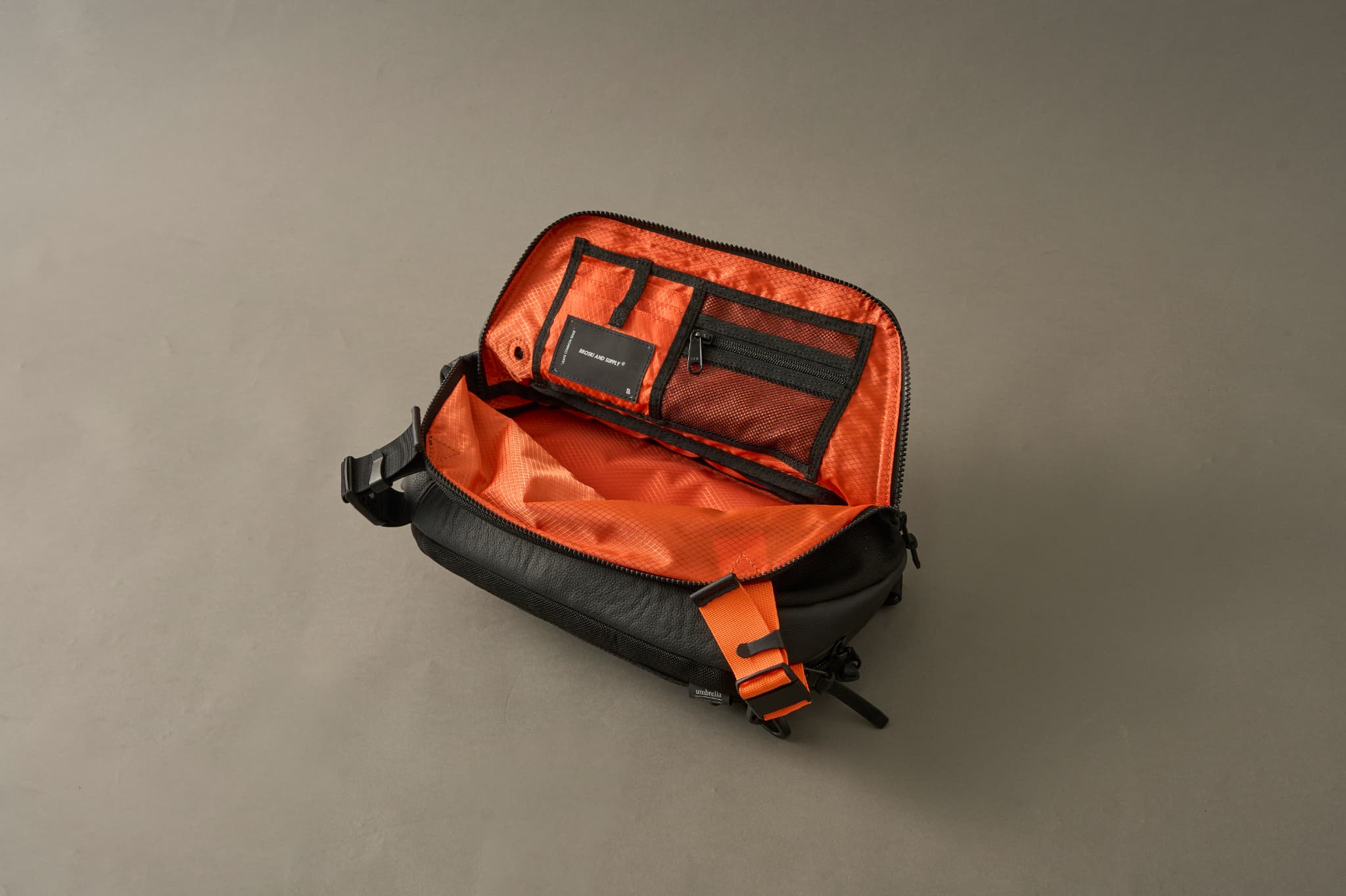 Adjust sling multi bag (BLACK×ORANGE)